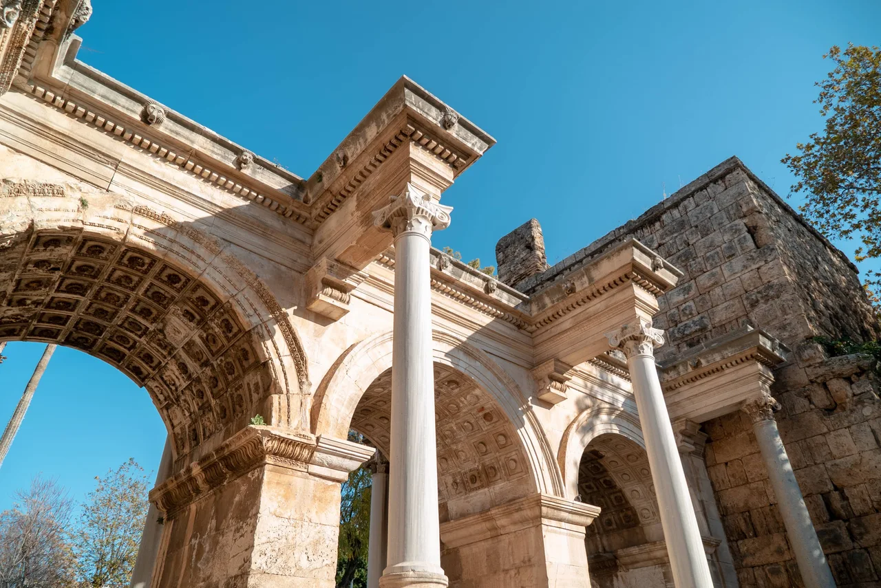 Decorated arches and columns of Hadrian’s Gate in Antalya