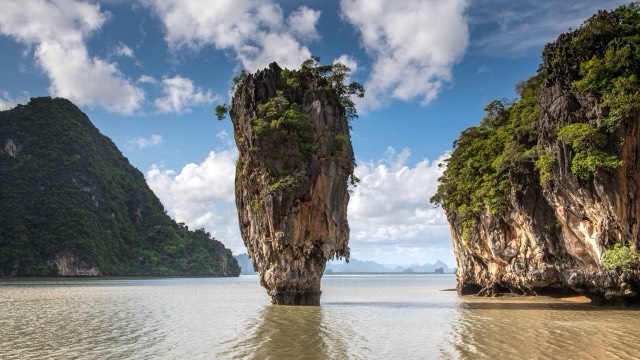 The Khao Tapu rock pillar standing in the water of Phang Nga Bay